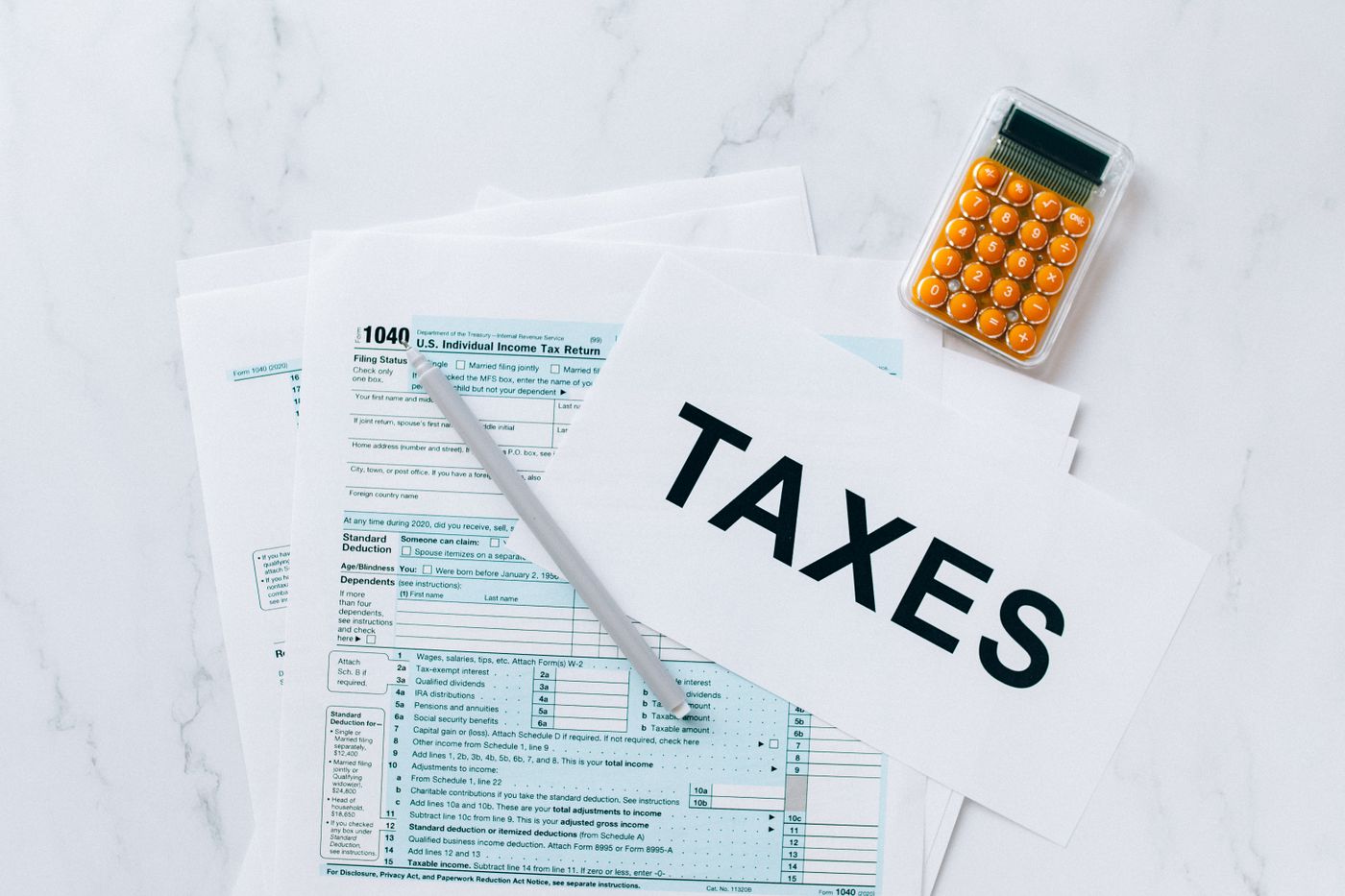 Tax paperwork and a calculator